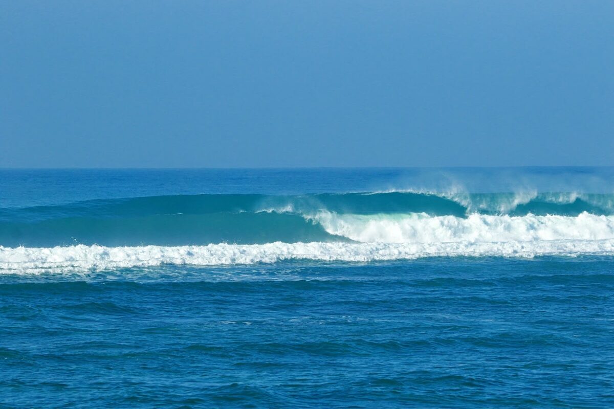 Clean barreling wave at a Lombok surf spot
