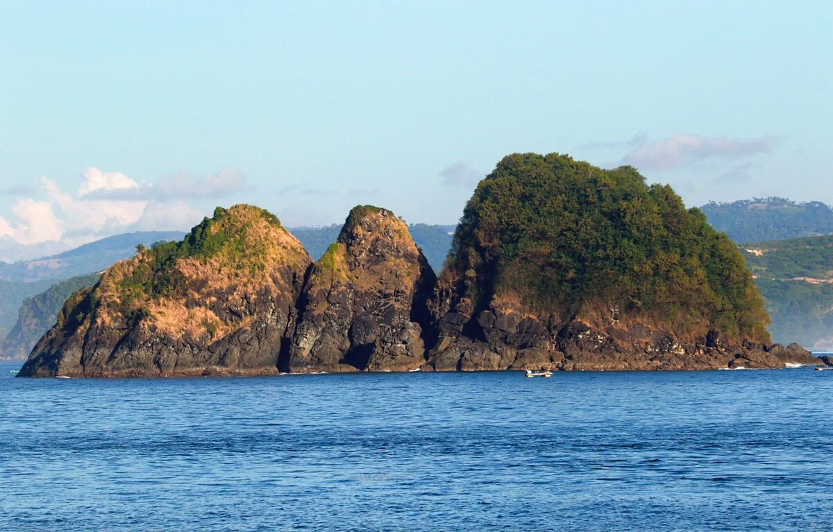 Rocky twin-peak island off the coast of Lombok